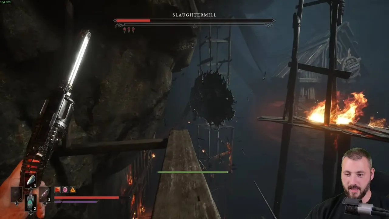 Valor Mortis bosses: weapon raised among Slaughtermill's underground platforms and hanging saws